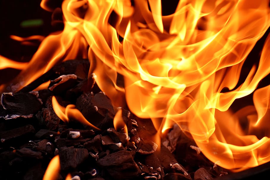 Carbon reacts with oxygen to produce carbon dioxide and energy.