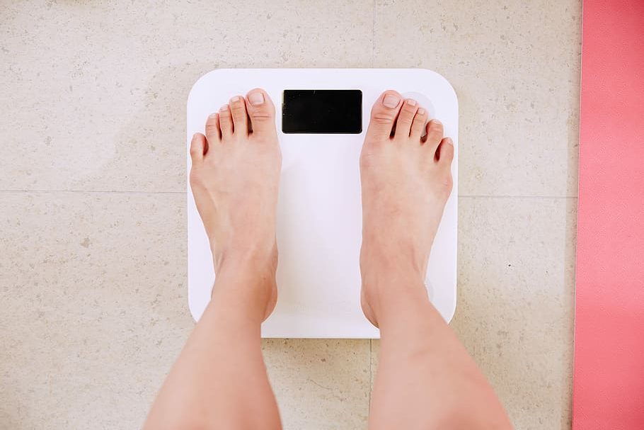 In your body, only about 1% of your weight comes from the weight of your constituent particles. The other 99% comes from the binding energy of the strong nuclear force.